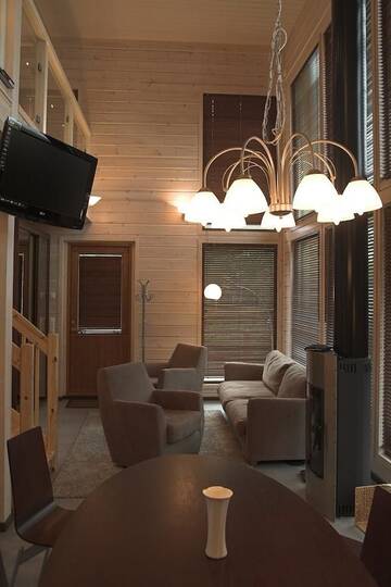 Фото номера Апартаменты с 3 спальнями и сауной Виллы Kiurunrinne Villas г. Иматра 8