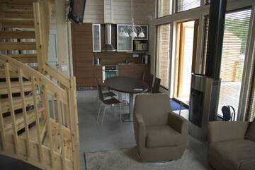 Фото номера Апартаменты с 3 спальнями и сауной Виллы Kiurunrinne Villas г. Иматра 51