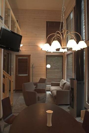 Фото номера Апартаменты с 3 спальнями и сауной Виллы Kiurunrinne Villas г. Иматра 56