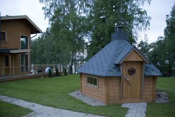 Фото номера Апартаменты с 3 спальнями и сауной Виллы Kiurunrinne Villas г. Иматра 54