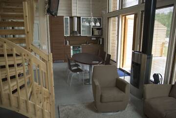 Фото номера Апартаменты с 3 спальнями и сауной Виллы Kiurunrinne Villas г. Иматра 21