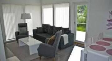 Фото номера Дом с 2 спальнями Дома для отпуска Holiday Houses Saimaa Gardens г. Иматра 4