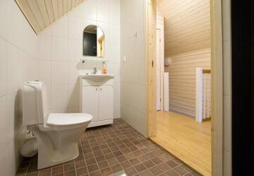 Фото номера Апартаменты с 2 спальнями Дома для отпуска Holiday Houses Saimaa Gardens г. Иматра 6