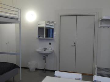 Фото номера Семейный номер с общей ванной комнатой Отель Immalanjärvi г. Иматра 4