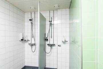 Фото номера Двухместный номер с 2 отдельными кроватями, общей ванной комнатой и доступом в спа-центр Хостелы Imatra Spa Sport Camp г. Иматра 7